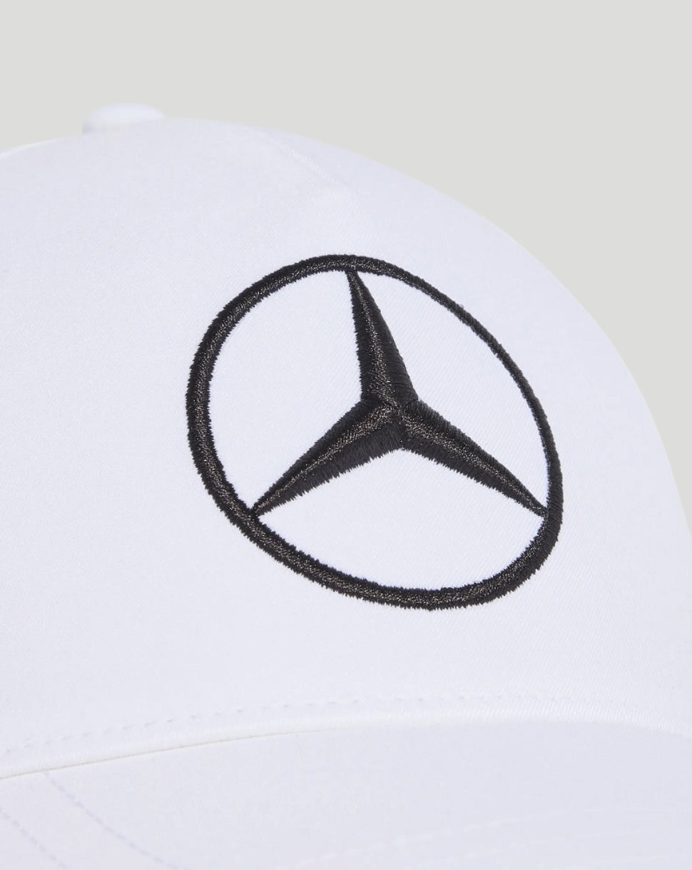 White cap with a black Mercedes emblem embroidered on the front panel.