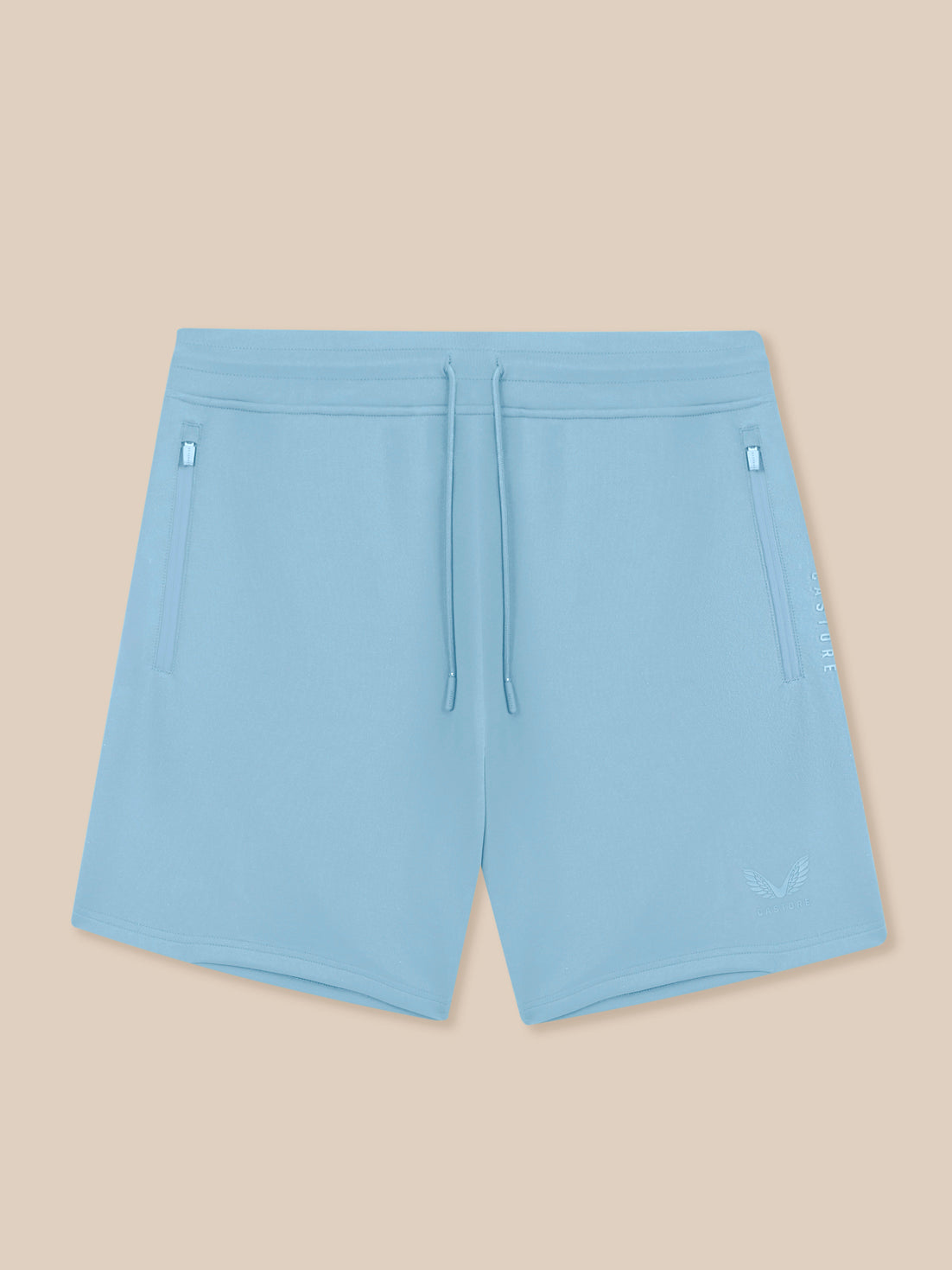 Light blue shorts on a beige background