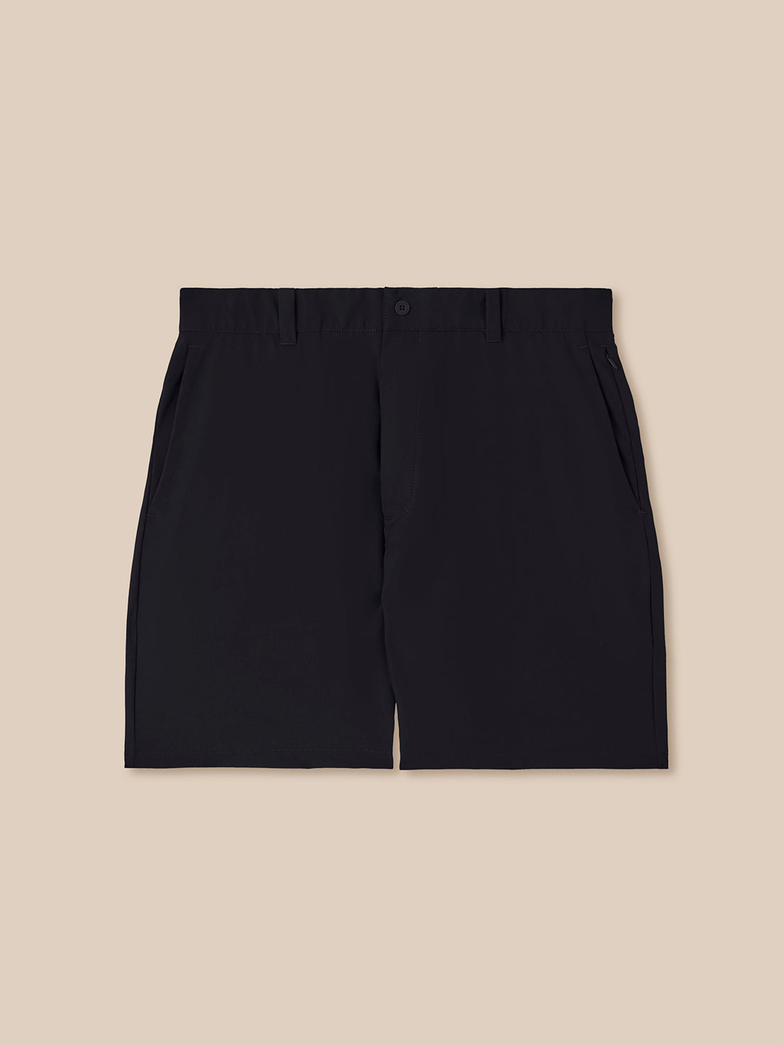 Black shorts on a beige background