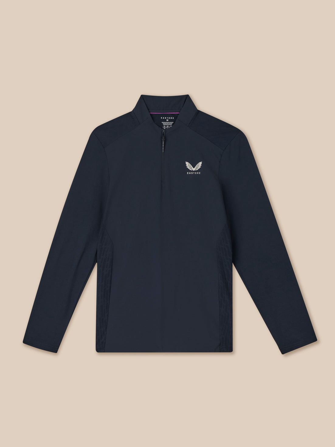Navy long-sleeve shirt with a logo on a beige background