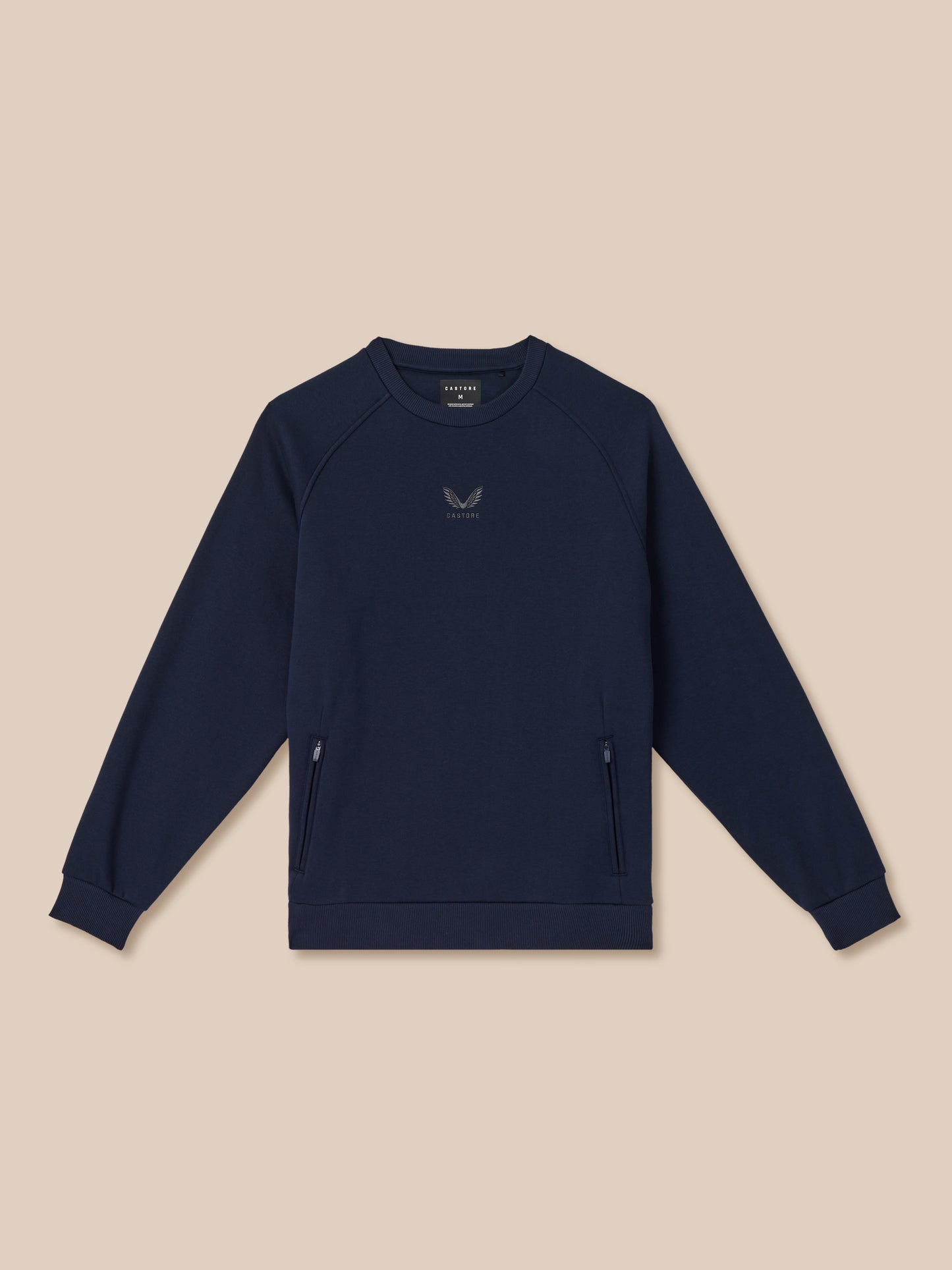 Navy blue sweatshirt with a logo on a beige background