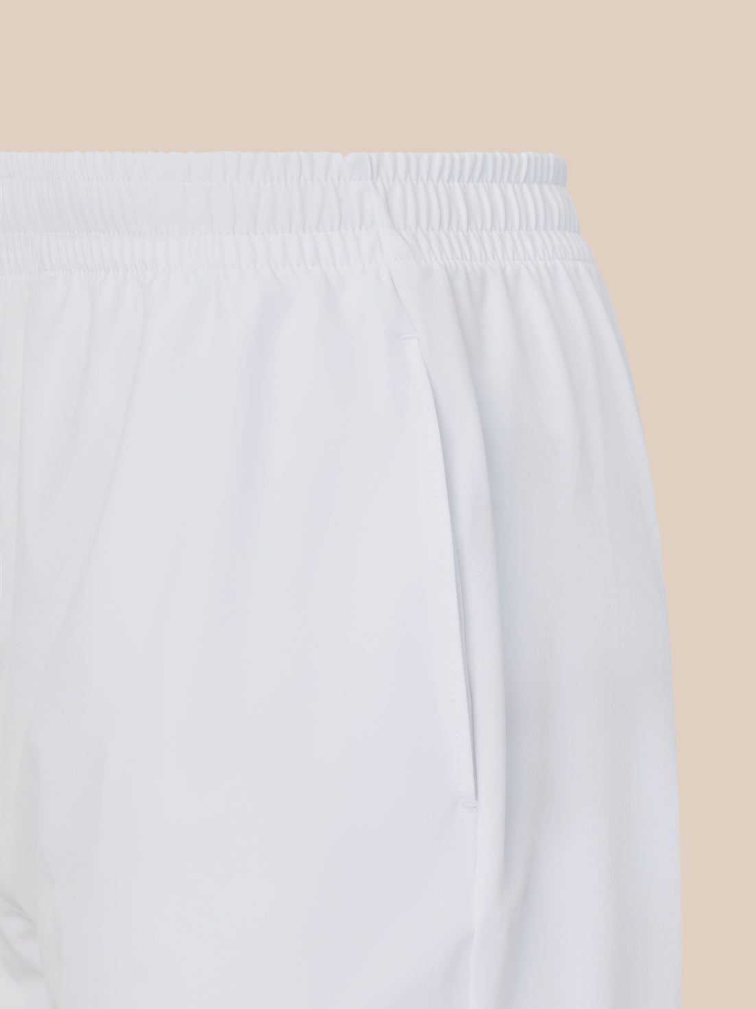 White shorts on a beige background