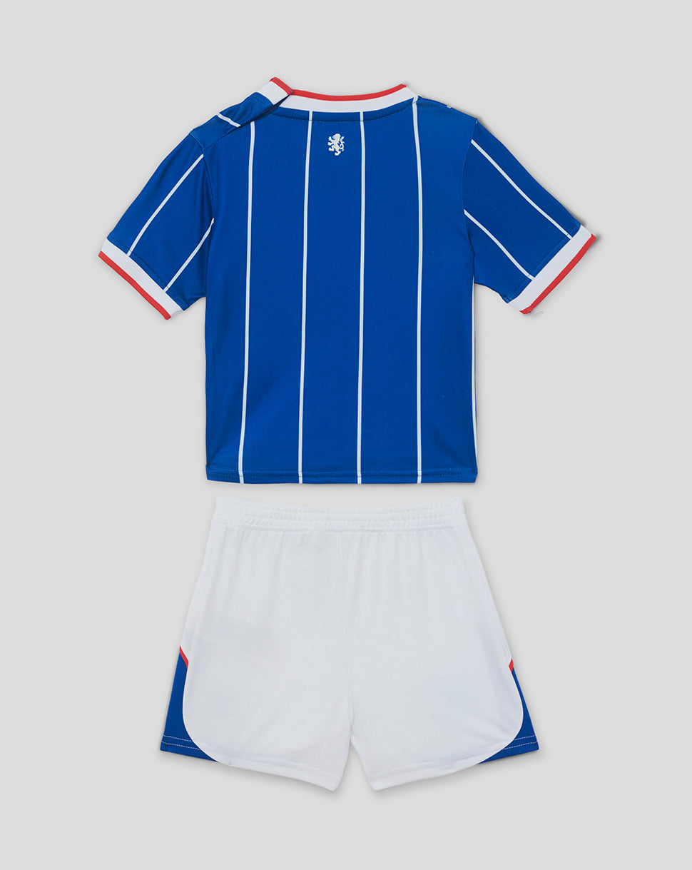Blue and white sports outfit with red accents on a light gray background
