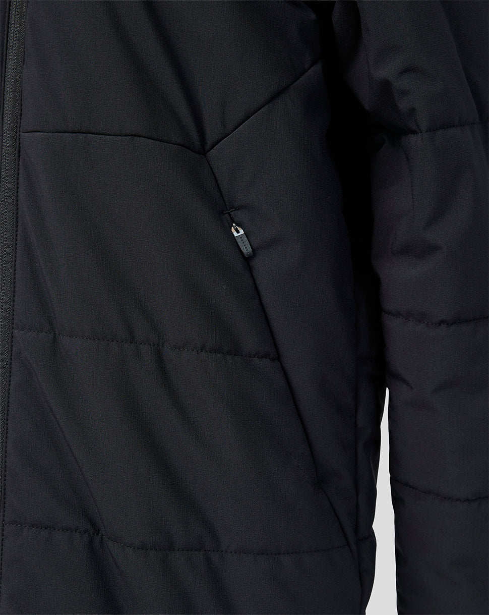 Detail of the black padded Feyenoord training jacket pocket with zipper.