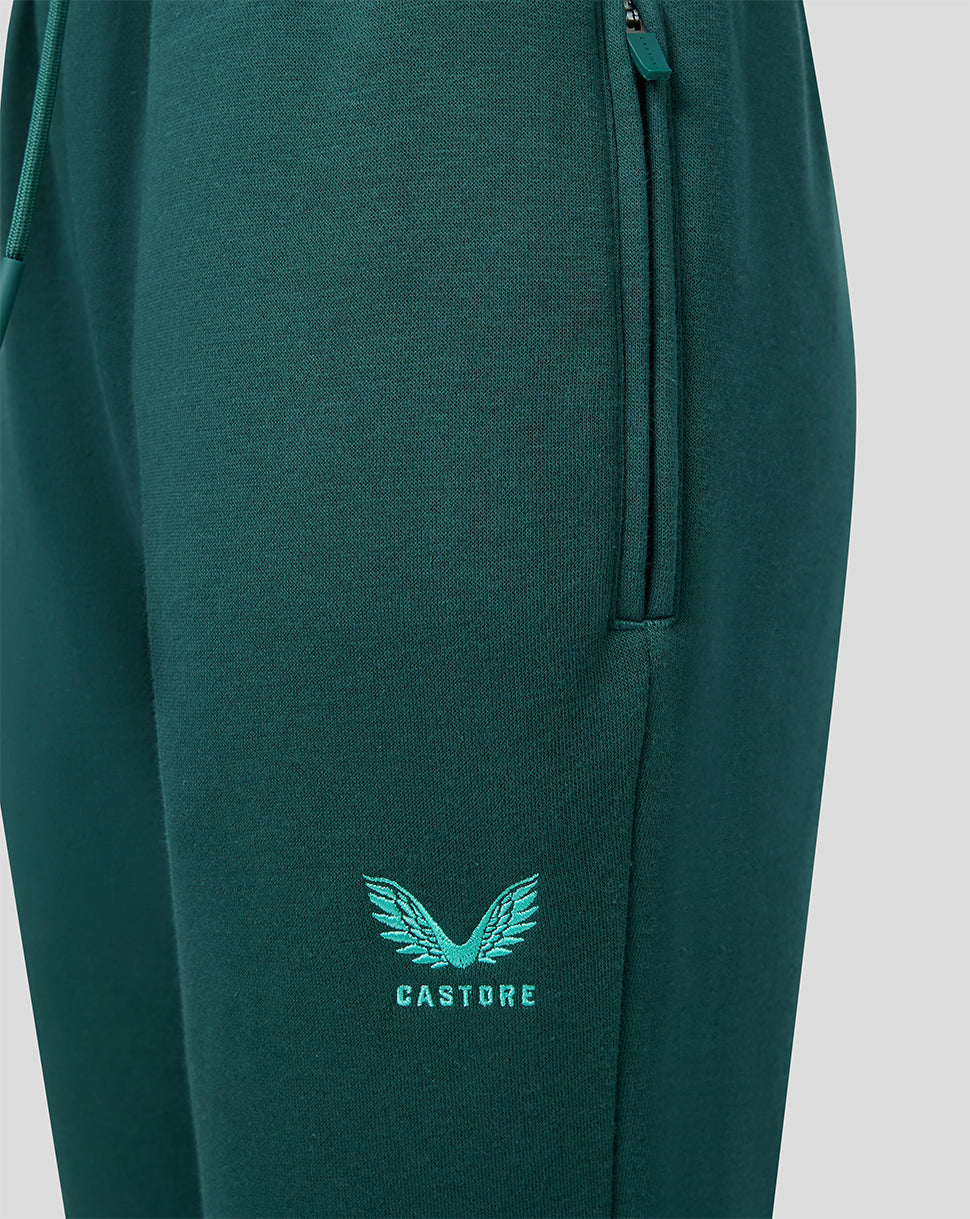 Logotipo Castore y emblema en la pierna de los joggers verdes para junior
