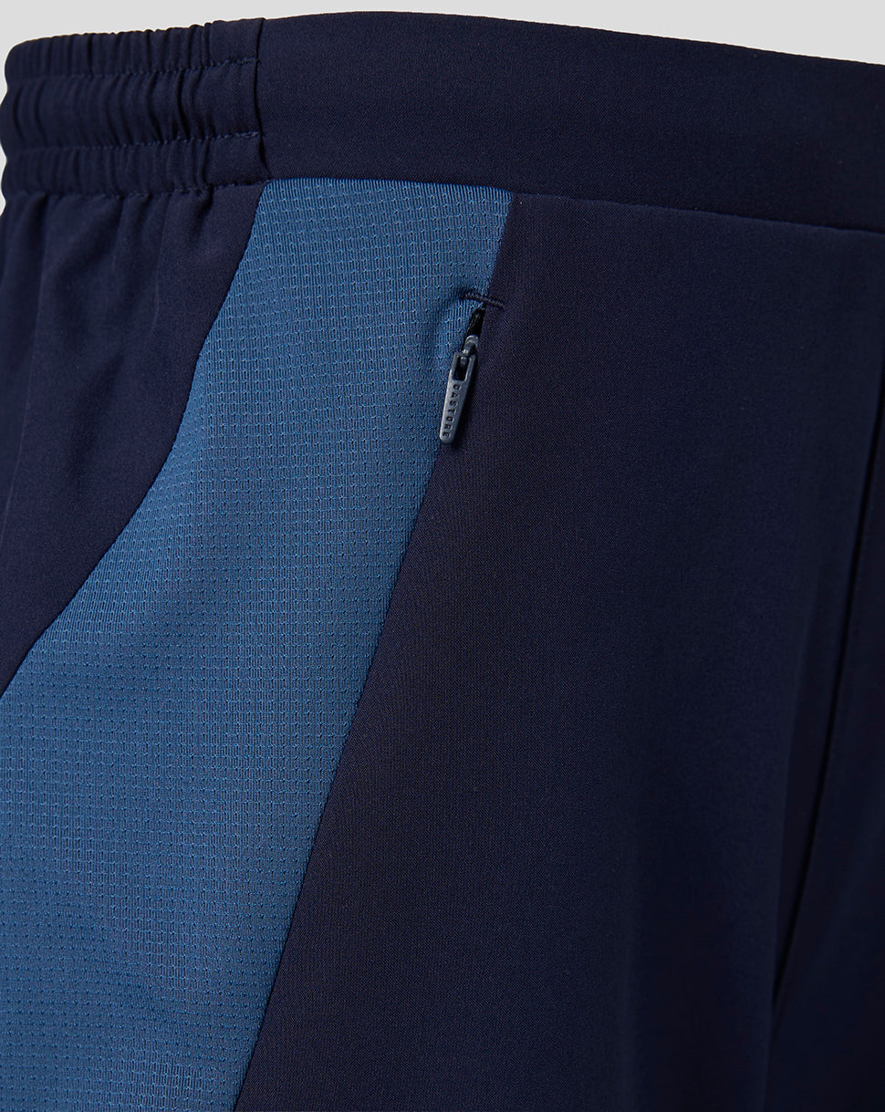 Navy FC Utrecht training shorts with blue side panel and zip pocket detail.