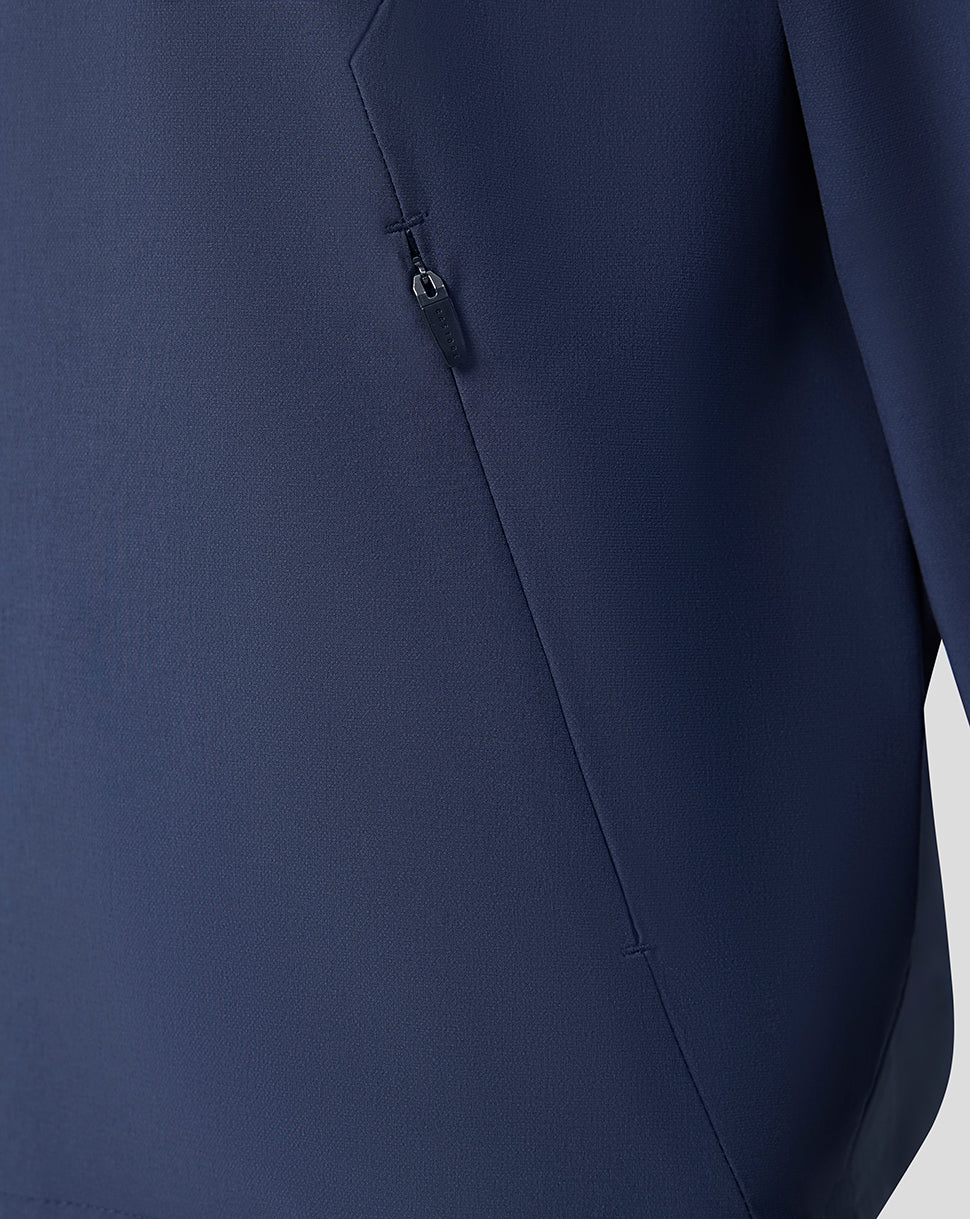 Close-up of navy blue Feyenoord jacket highlighting a vertical side zip pocket