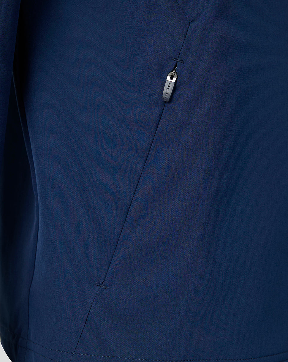 Navy jacket front detail with full zip closure and seam lines.
