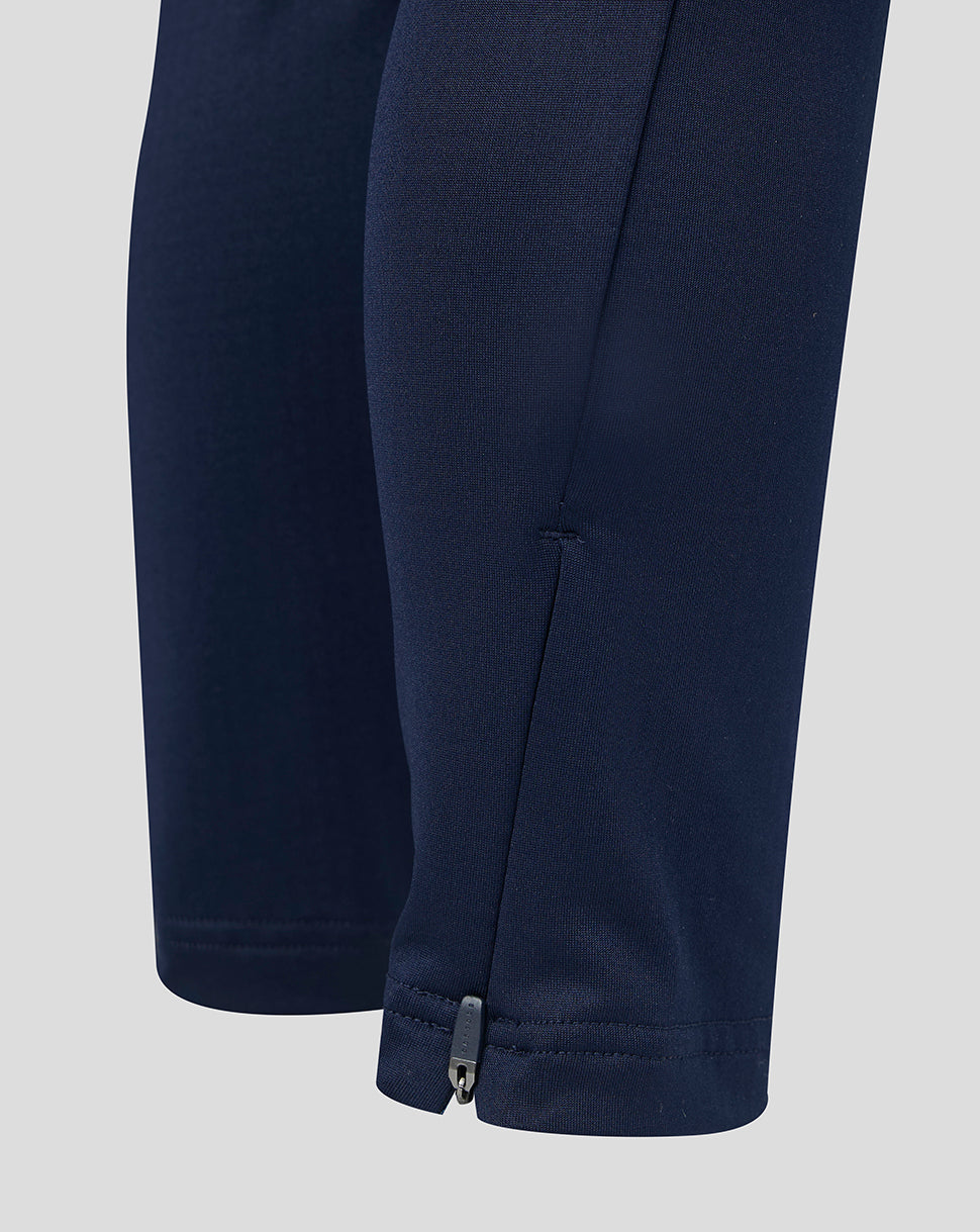Close up of navy junior training pants leg with a zipper at the ankle