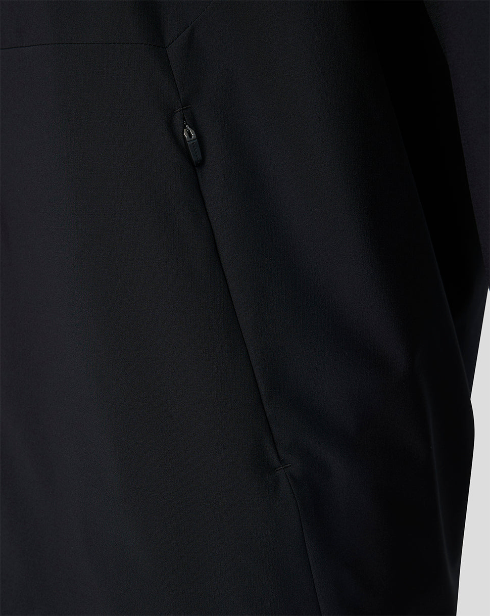 Close-up of side zip pocket on black Feyenoord training coach rain jacket