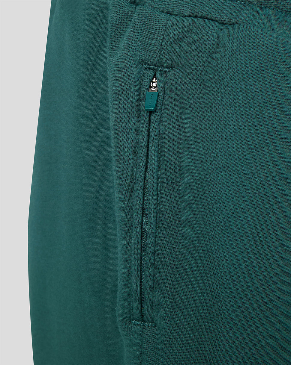 Close up of green Feyenoord travel fleece joggers with a vertical zip pocket.