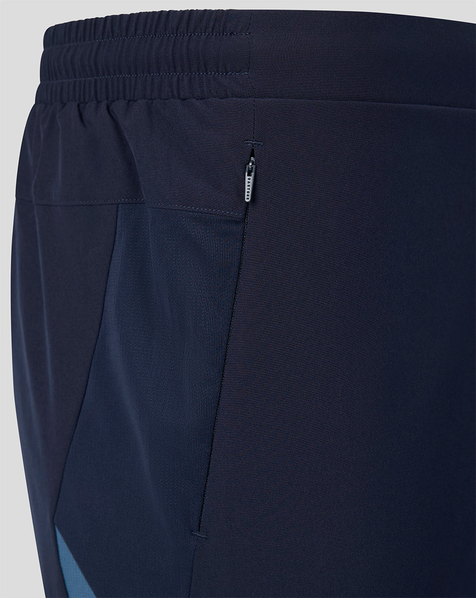 Navy FC Twente training shorts close-up showing a vertical zip pocket and contrast side panel