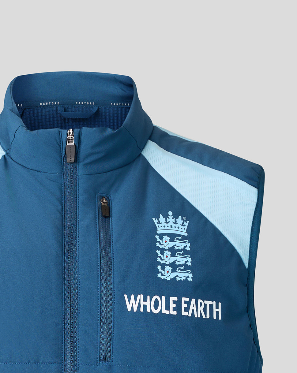 Blue vest with 'Whole Earth' logo on a gray background