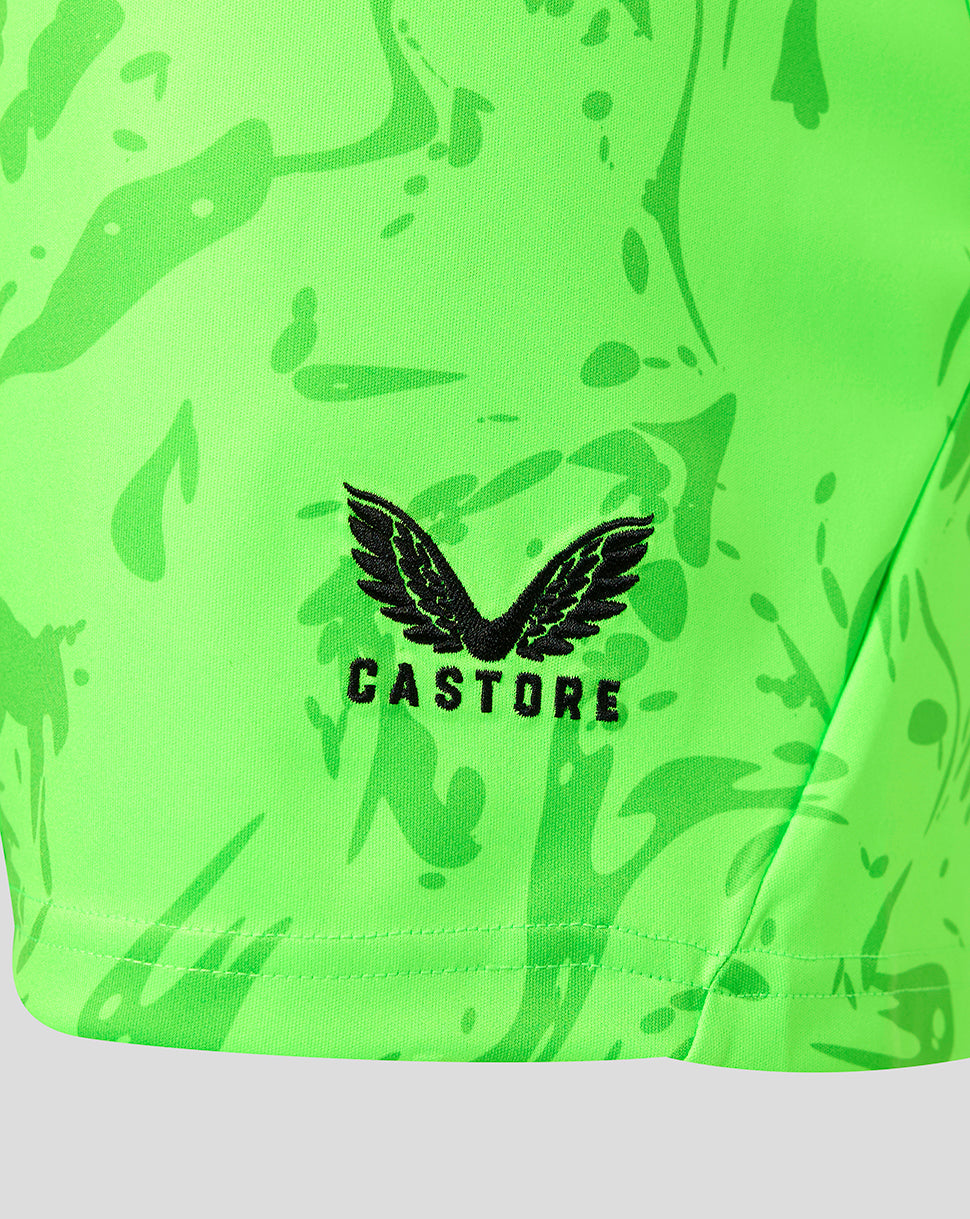 Neon green FC Twente goalkeeper shorts with black Castore logo.