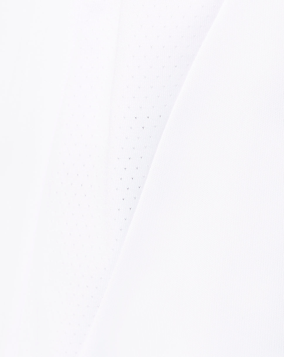White football shorts fabric with perforations and diagonal panel detail