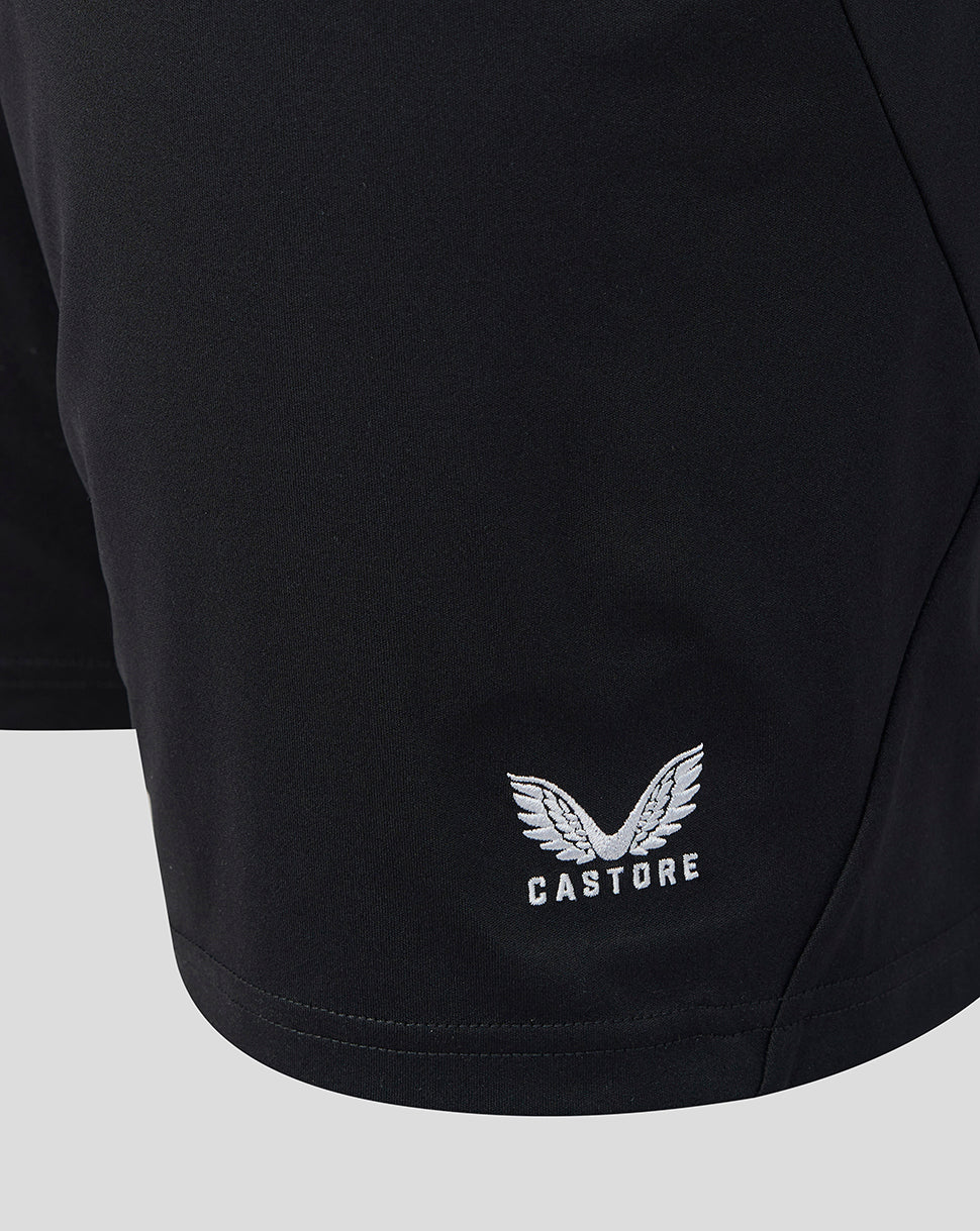Black shorts featuring Castore logo and a small winged crest near the hem