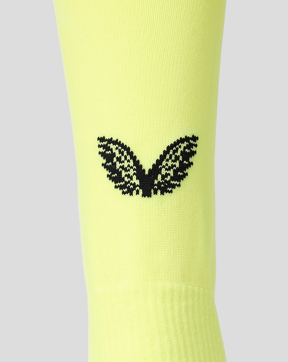 Neon yellow FC Utrecht goalkeeper sock with black wing logo on the shin.
