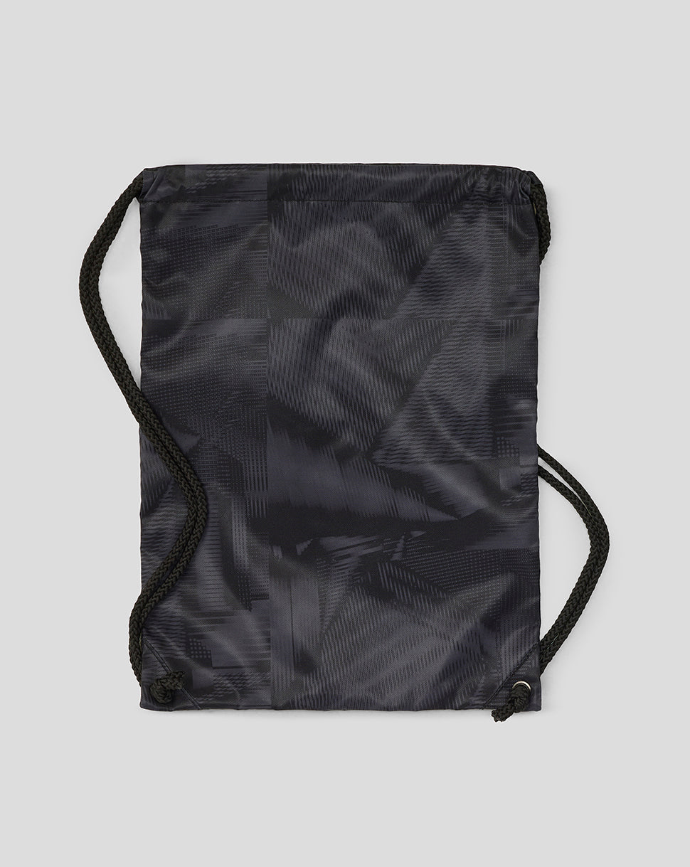 Black drawstring bag on a light gray background