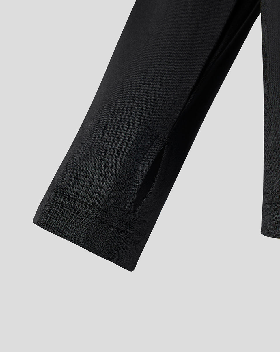 Sleeve detail of the black Feyenoord training midlayer with a zip opening at the cuff