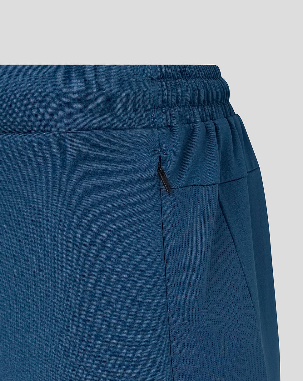 Blue pants with a drawstring waist on a light gray background