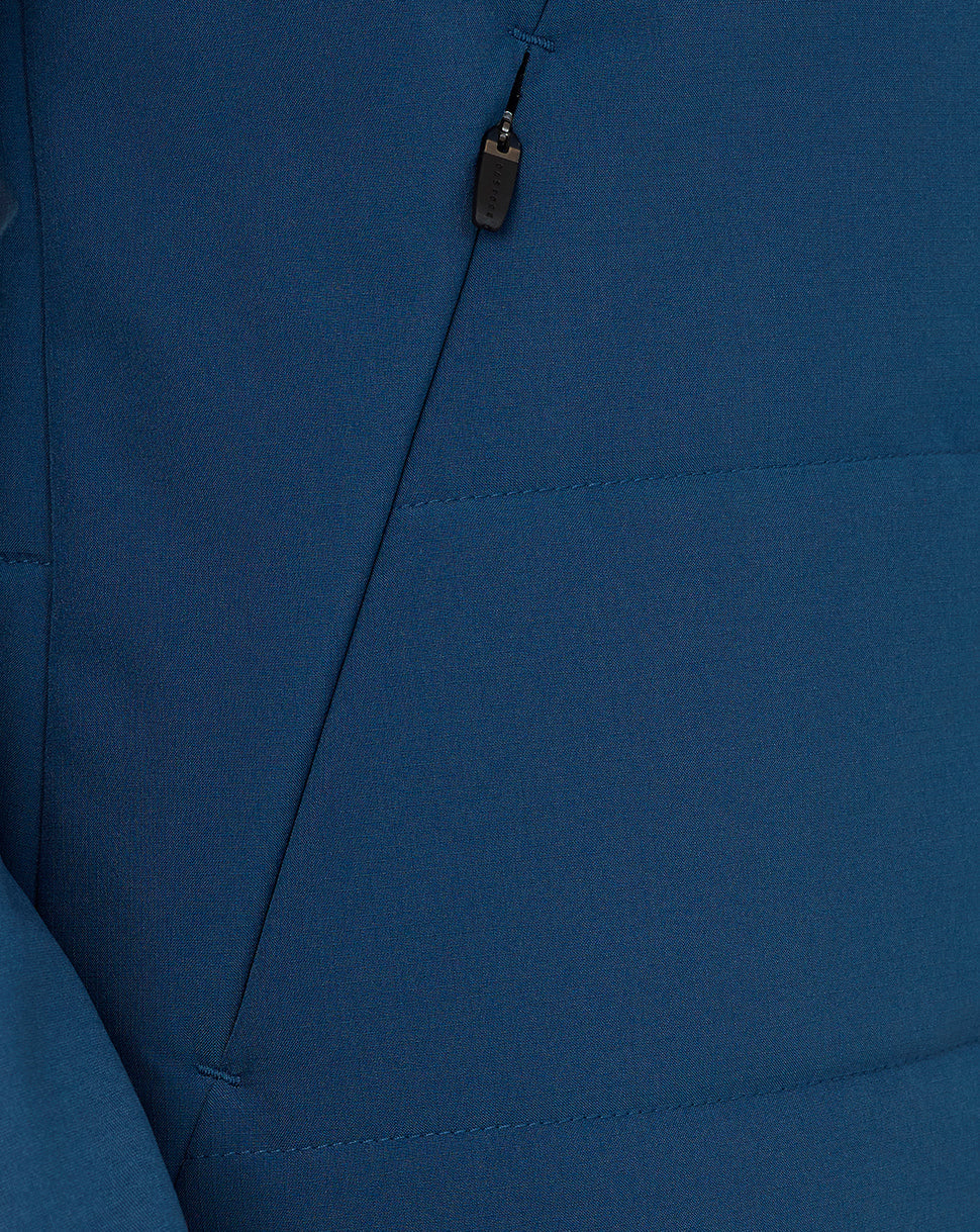 Close-up of a blue jacket with a zipper detail
