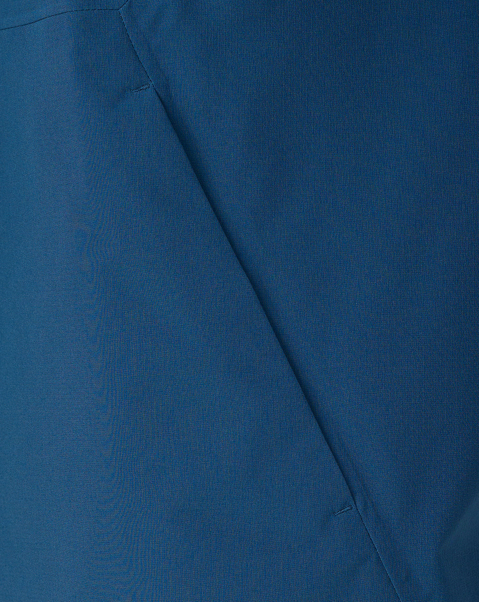 Close-up of blue fabric with a visible seam