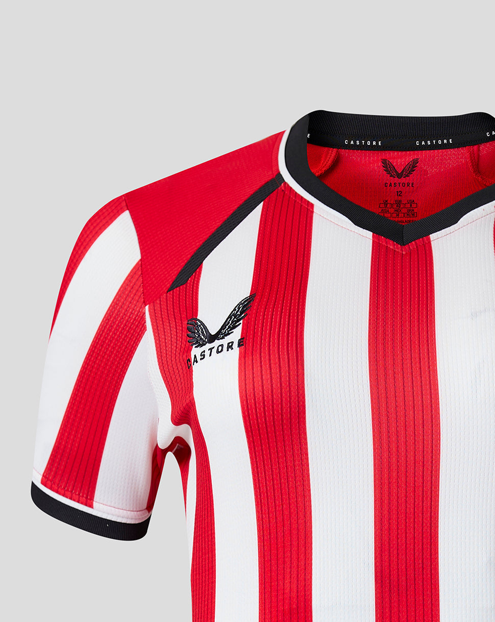 Neckline and shoulder of red and white striped Athletic Club shirt with black trim and Castore branding