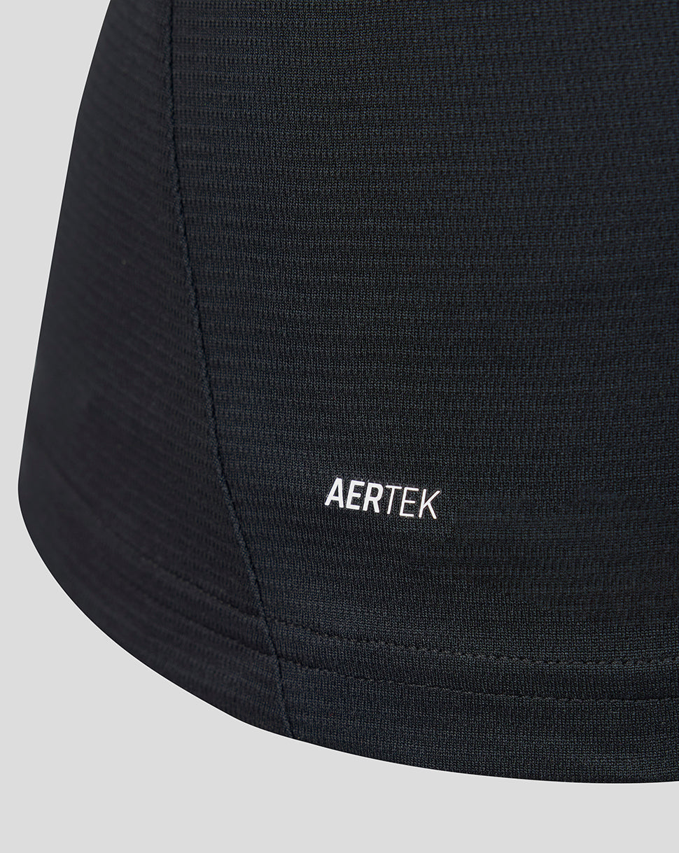 Close-up of black fabric from Athletic Club women's 26/27 away shirt with AERTEK branding near the hem
