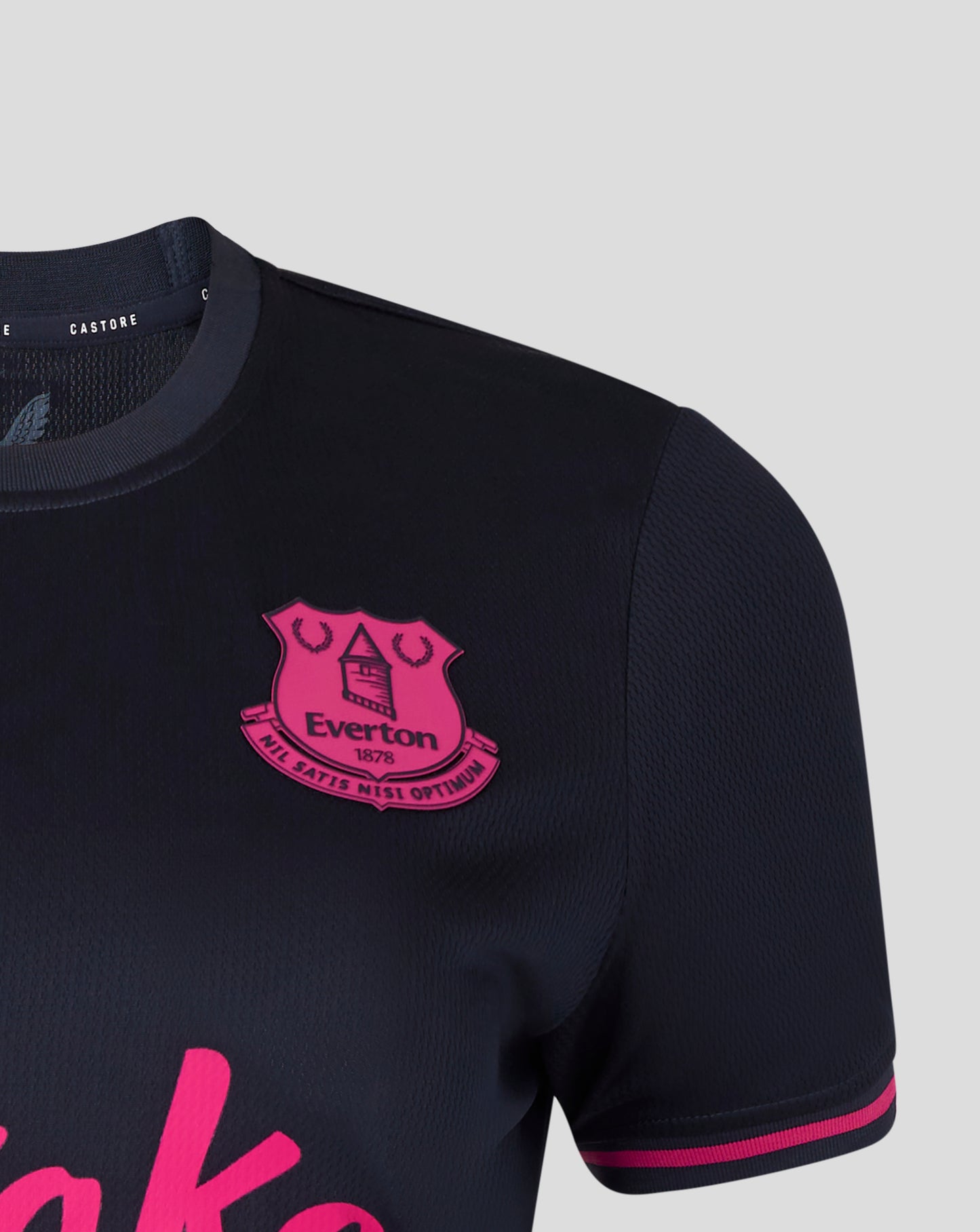 Black sports jersey with pink logo and text on a light gray background