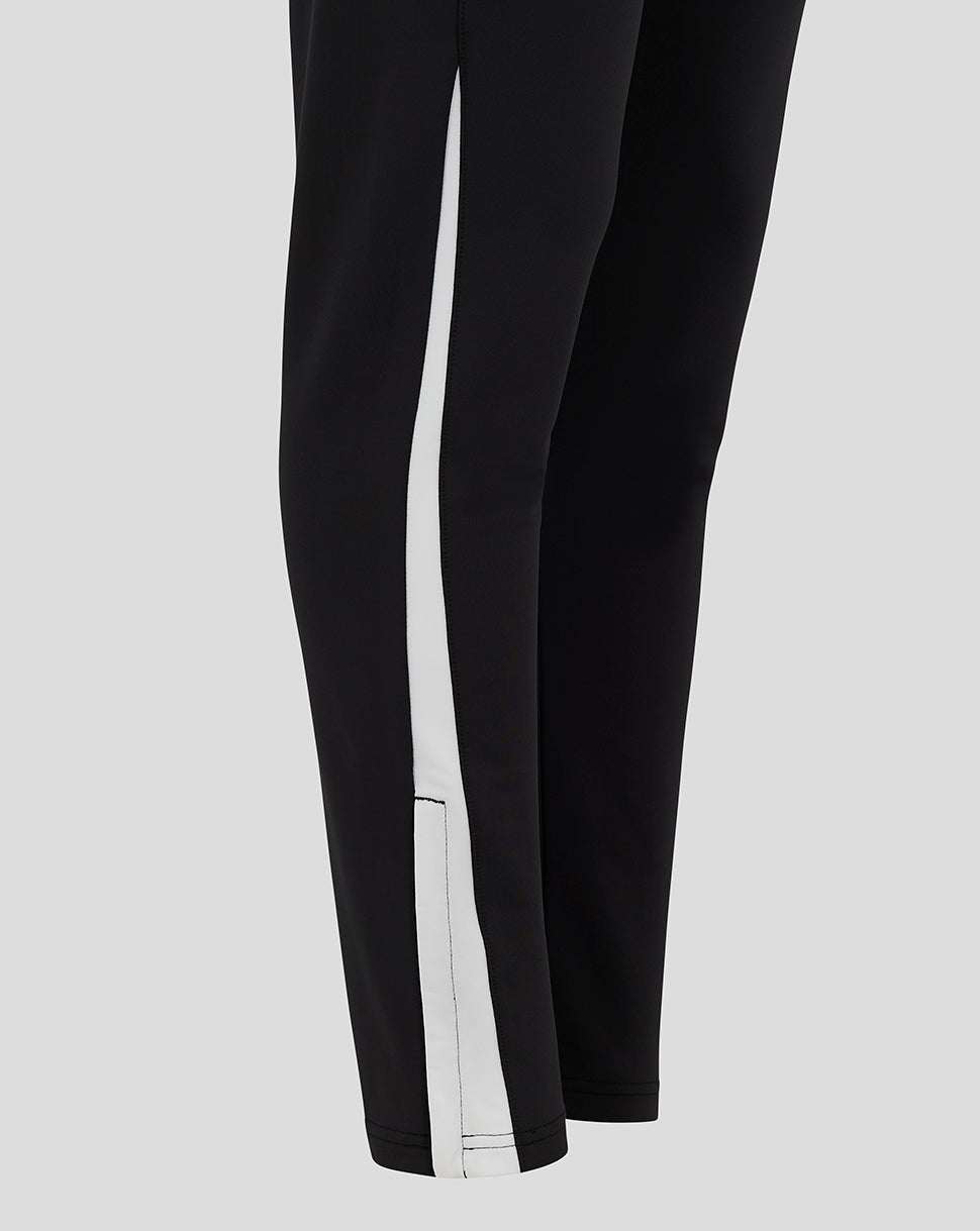 Legs wearing Feyenoord women's black third matchday pants with a white side stripe.