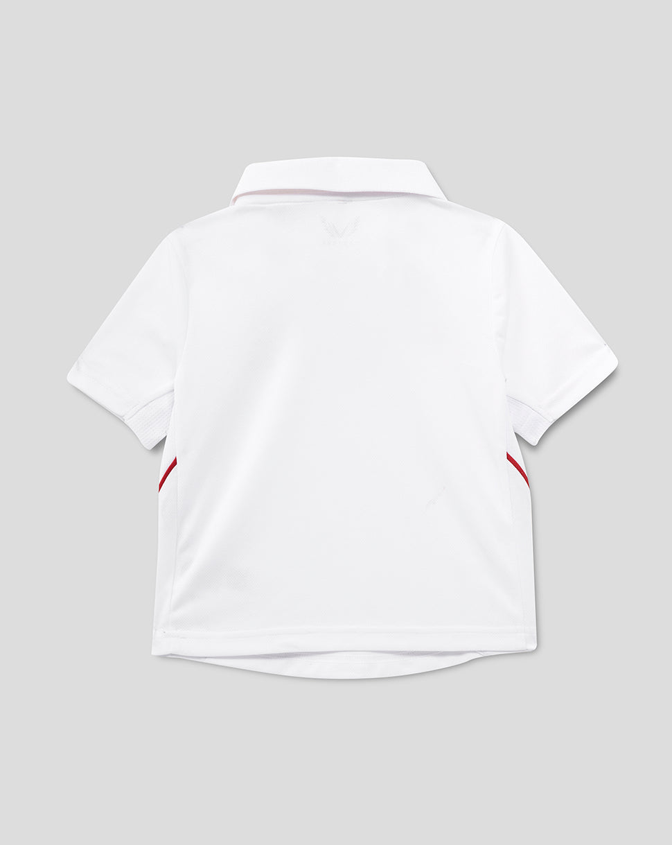 White polo shirt with red accents on a gray background