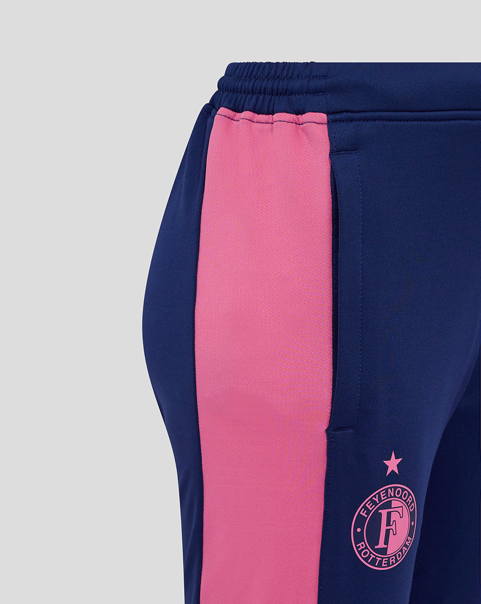 Close-up of navy pants with pink side panel and Feyenoord crest at the hip