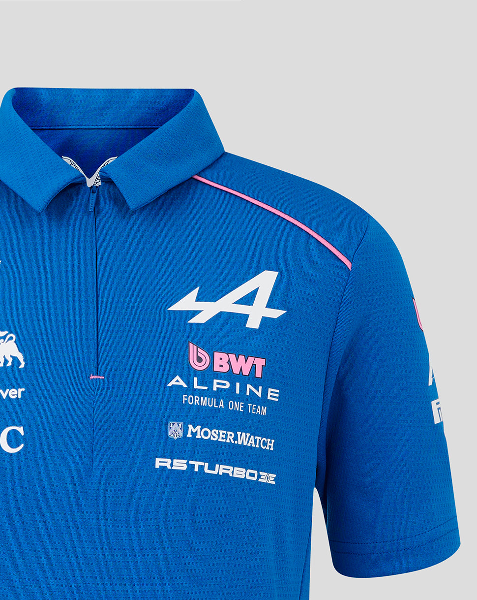 Close-up of blue polo chest with large white number 44 and BWT Alpine branding with sponsor decals.