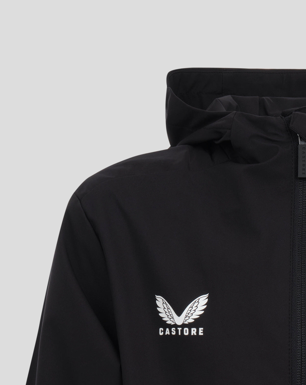 Back view of black Sevilla junior training jacket with hood and zip detail