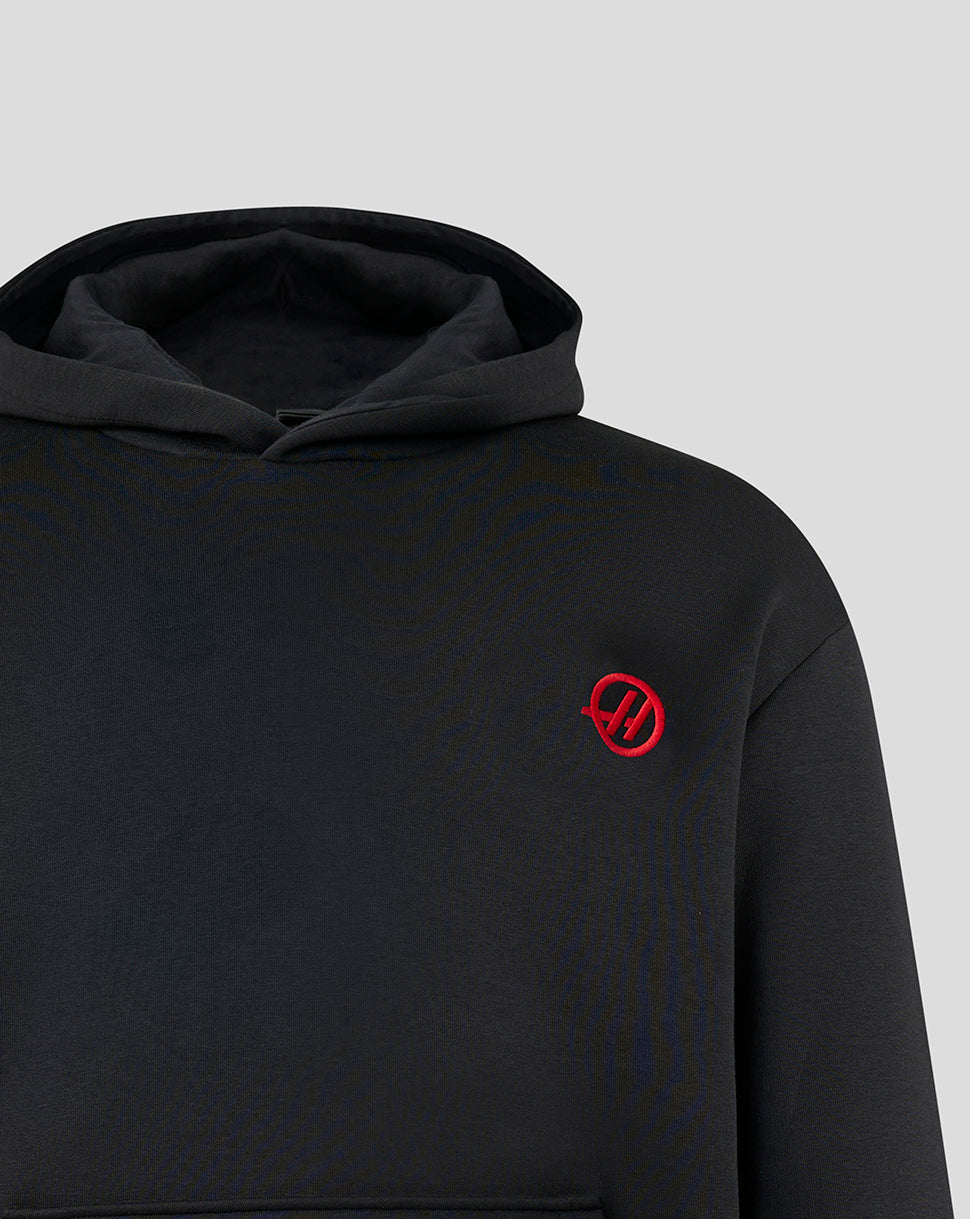 Black hoodie with a red logo on a light gray background