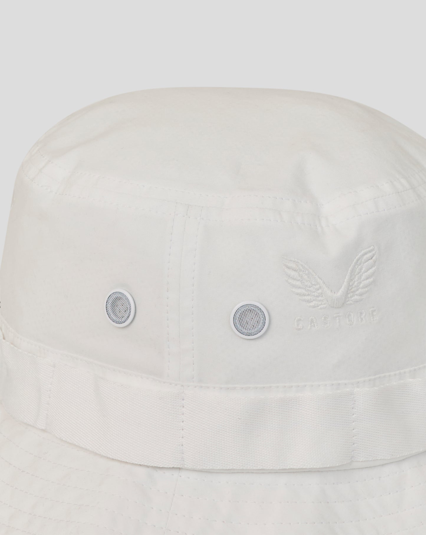 White bucket hat with brand logo on a light gray background