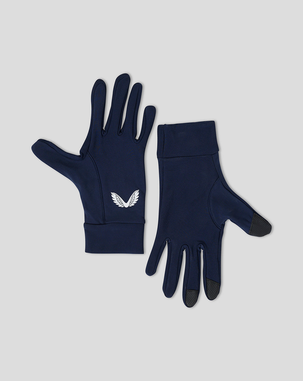 Pair of navy Peacoat Performance Gloves laid flat on a light background with visible logo.