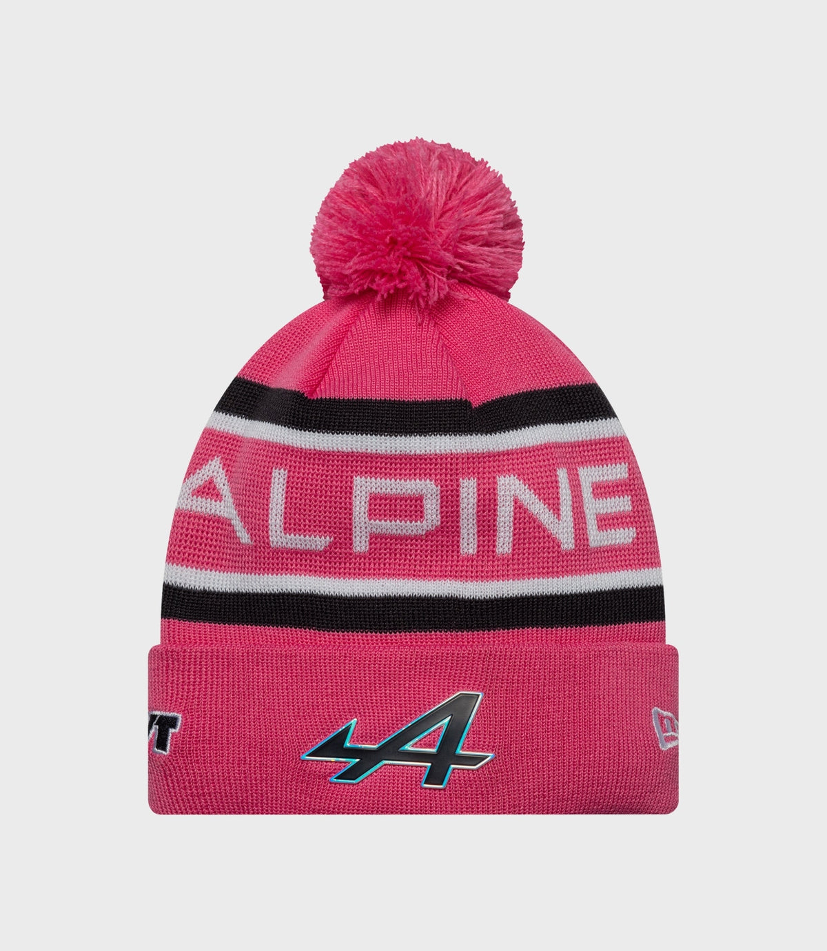 Pink cuff knit beanie with a fluffy pom pom on top and Alpine text on the folded cuff