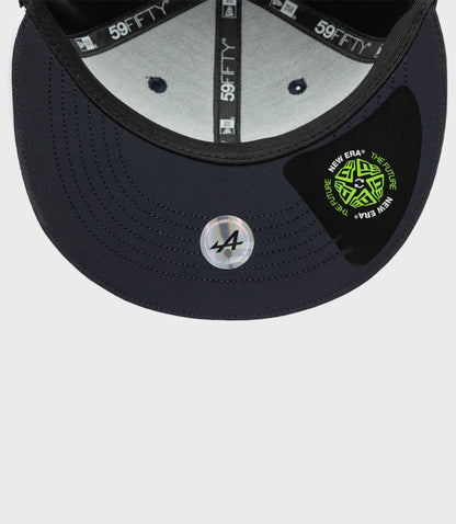 Interior close up of a navy New Era 59FIFTY cap showing 59FIFTY tape and stitched panels with recycled fabric construction