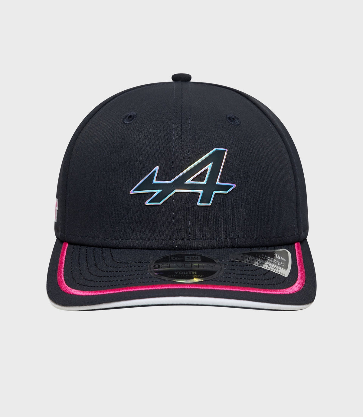 Front view of navy 9Seventy Stretch Snap Junior cap with a holographic emblem on the crown