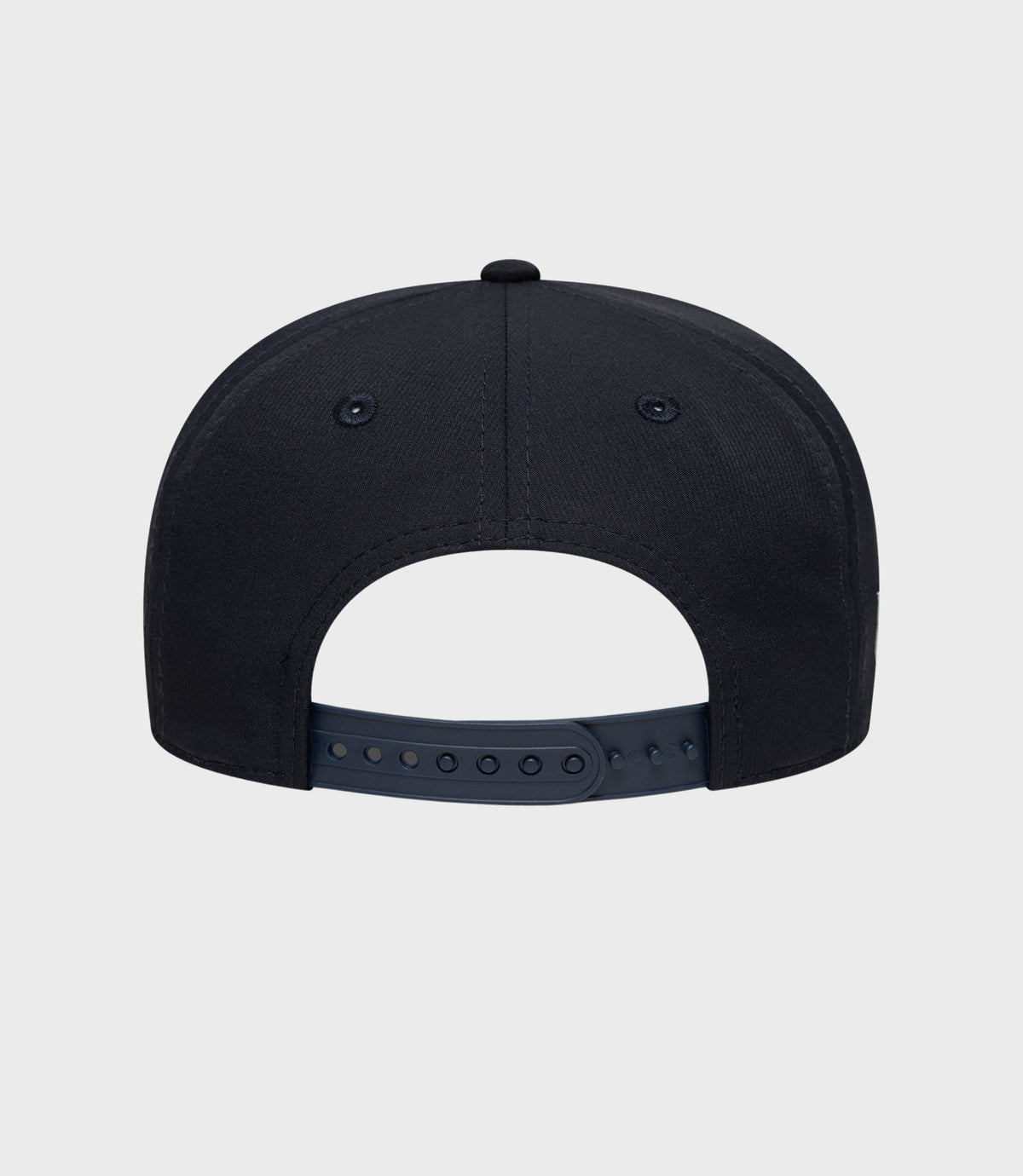 Back view of navy Rep Team 9Seventy Stretch Snap Junior cap with adjustable plastic strap