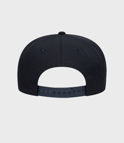 Back view of navy Rep Team 9Seventy Stretch Snap Junior cap with adjustable plastic strap