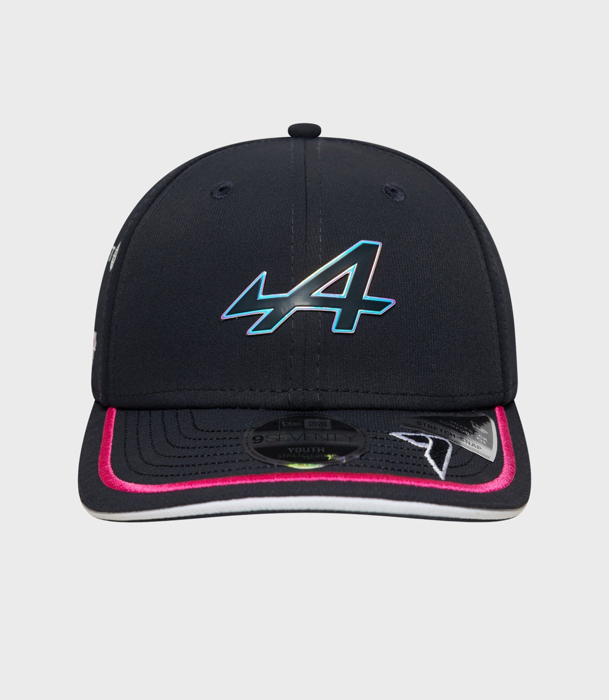 Front view of navy 9Seventy cap with curved brim and stitched panels