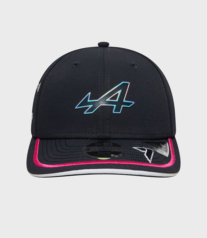 Front view of navy 9Seventy cap with curved brim and stitched panels