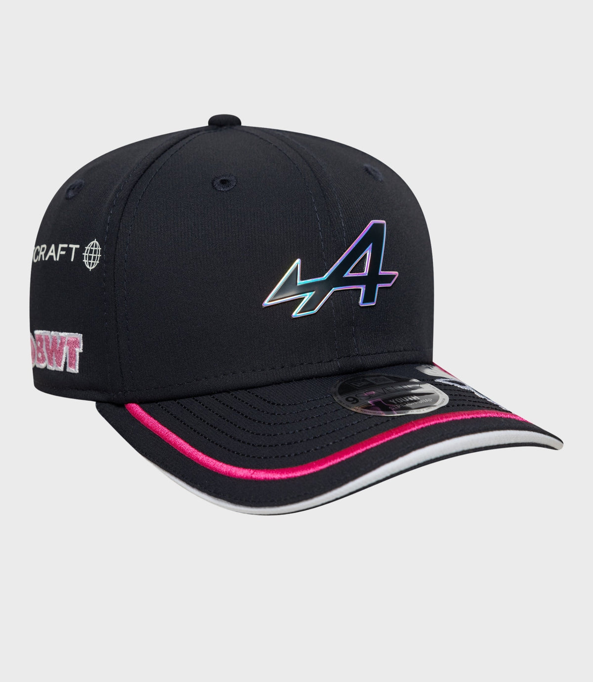 Front of navy cap with iridescent logo on crown pink piping along brim and sticker on brim