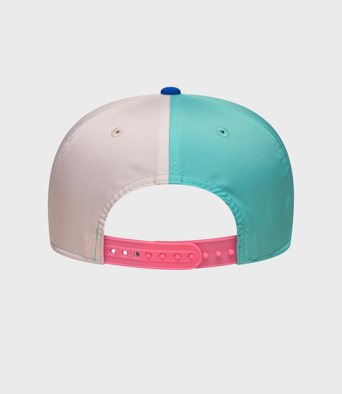 Front angle of the cap showing white crown with geometric print turquoise brim and blue top button