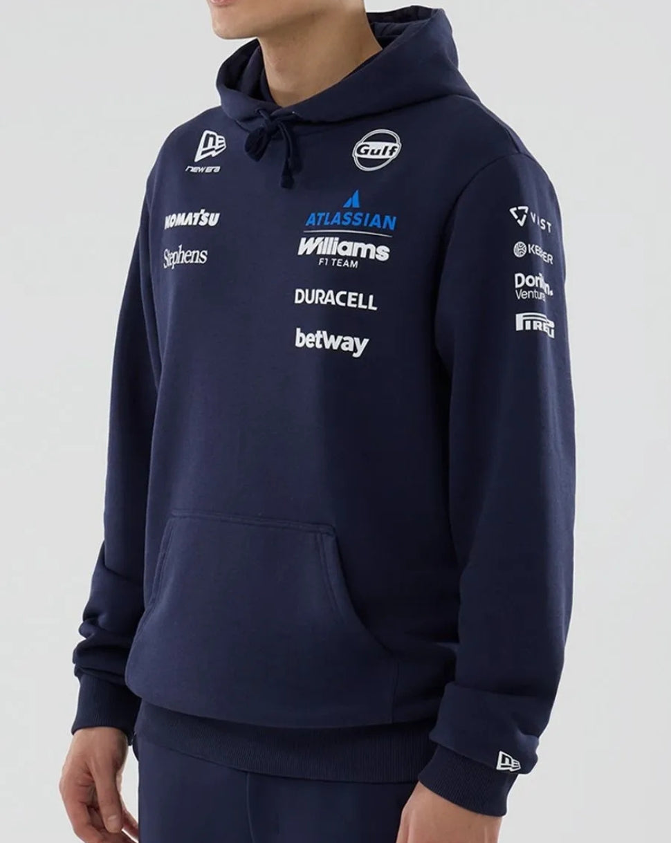 Navy Williams Racing F1 hoodie with Atlassian Williams Team logo on the left chest and partner logos across the chest and sleeves, plus a front kangaroo pocket and drawstrings