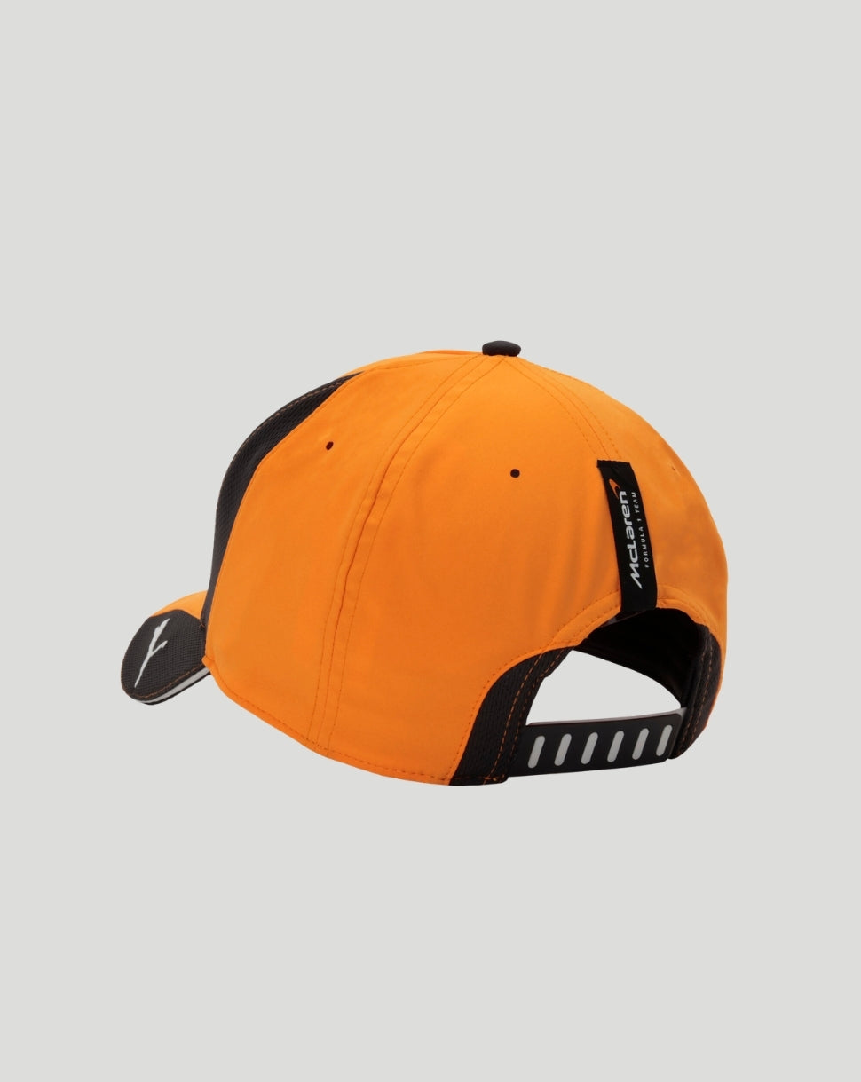 Rear angled view of Papaya orange McLaren Norris cap showing back strap and branding.