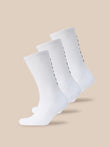Three white Castore X Paynter crew socks with black branding along the side