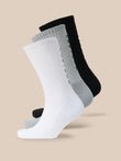 Trio of Castore X Sandham crew socks in white grey and black arranged diagonally.
